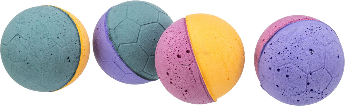 Vier bunte, zweifarbige Bälle mit einer strukturierten Oberfläche in den Farben Blau, Lila, Gelb und Pink.