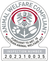 Graues und rotes Siegel mit Adler, Text "ANIMAL WELFARE COMPLIANT", "AUST. ANIMAL WELFARE ACT", Inspektionsnummer 202310035.