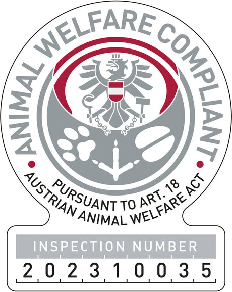 Graues und rotes Siegel mit Adler, Text "ANIMAL WELFARE COMPLIANT", "AUST. ANIMAL WELFARE ACT", Inspektionsnummer 202310035.