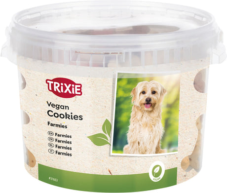 Durchsichtiger Eimer mit Trixie-Logo, Vegan Cookies-Aufschrift, Hundebild und Blatt-Symbol, enthält Kekse.