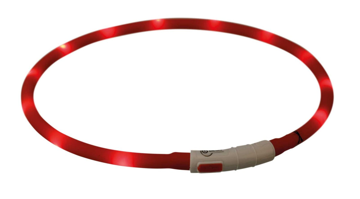Leuchtendes rotes Band in Kreisform mit weißem Kunststoffverschluss und sichtbaren Lichtpunkten.