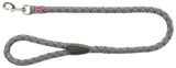 Geflochtene graue Hundeleine mit silbernem Karabiner und schwarzer Verstärkung, Text "TRIXIE" auf Etikett sichtbar.