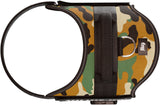 Hundegeschirr in Camouflage-Design mit schwarzen Riemen und silbernem D-Ring, Logo "JK9" sichtbar.