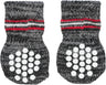 Zwei dunkelgraue Stricksocken mit roten und weißen Streifen sowie weißen runden Noppen auf den Sohlen.