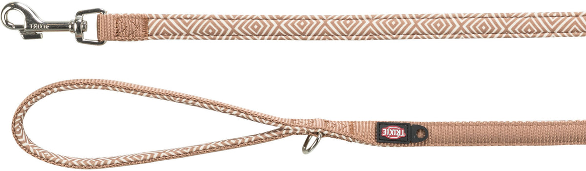 Beigefarbene Hundeleine mit geometrischem Muster und Metallclip, Marke Trixie, erkennbar.