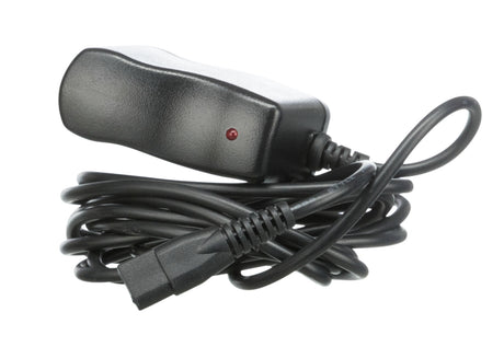 Schwarzes Netzteil mit roter Kontrollleuchte und aufgerolltem Kabel.