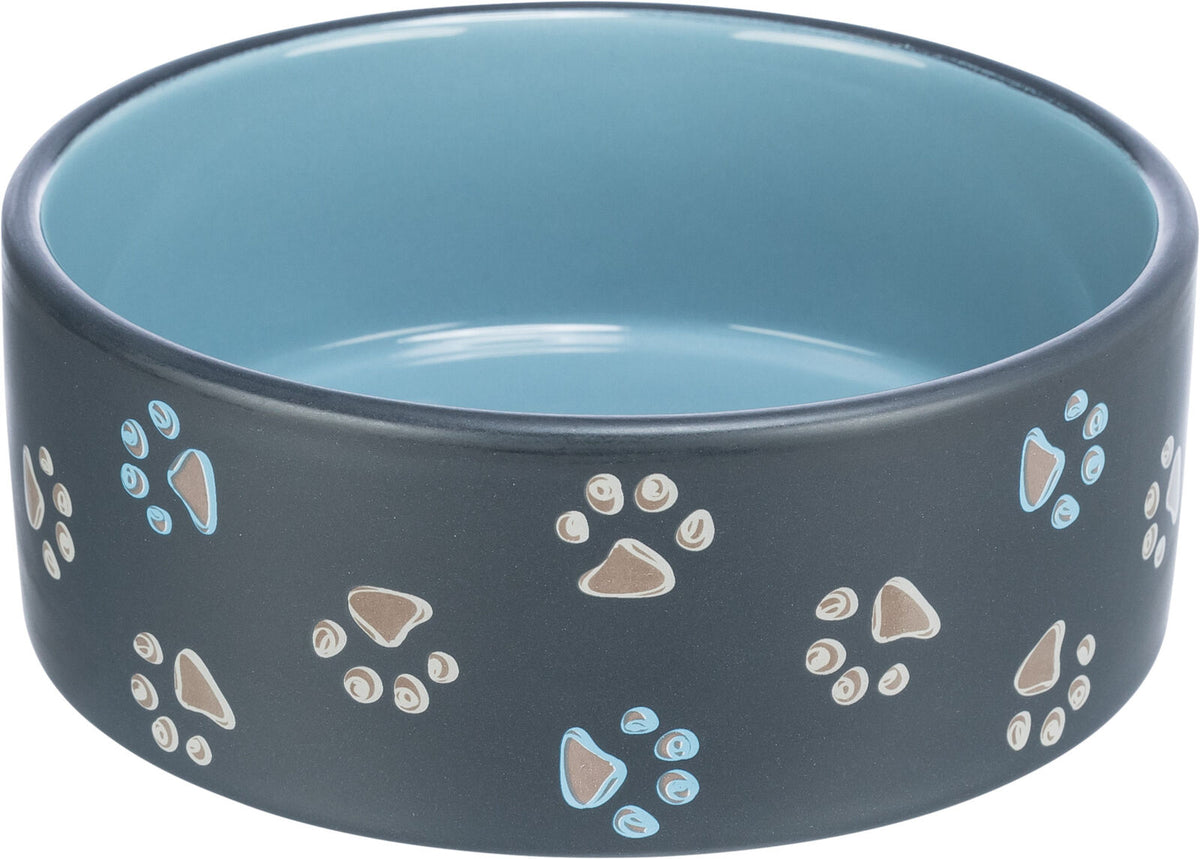Runde, blaue Futterschale mit grauem Rand, verziert mit Pfotenabdrücken in Blau und Beige.