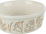 Keramikschüssel mit beige-grauem Pflanzenmuster auf der Außenfläche, runde Form, weißer Grundton.