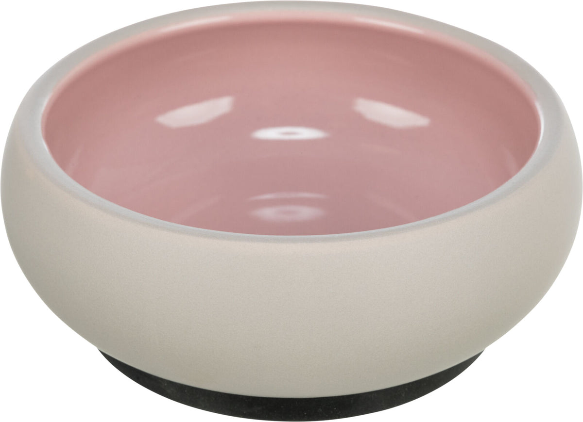 Rosa und beige Schale mit glatter Oberfläche und abgerundeten Kanten.