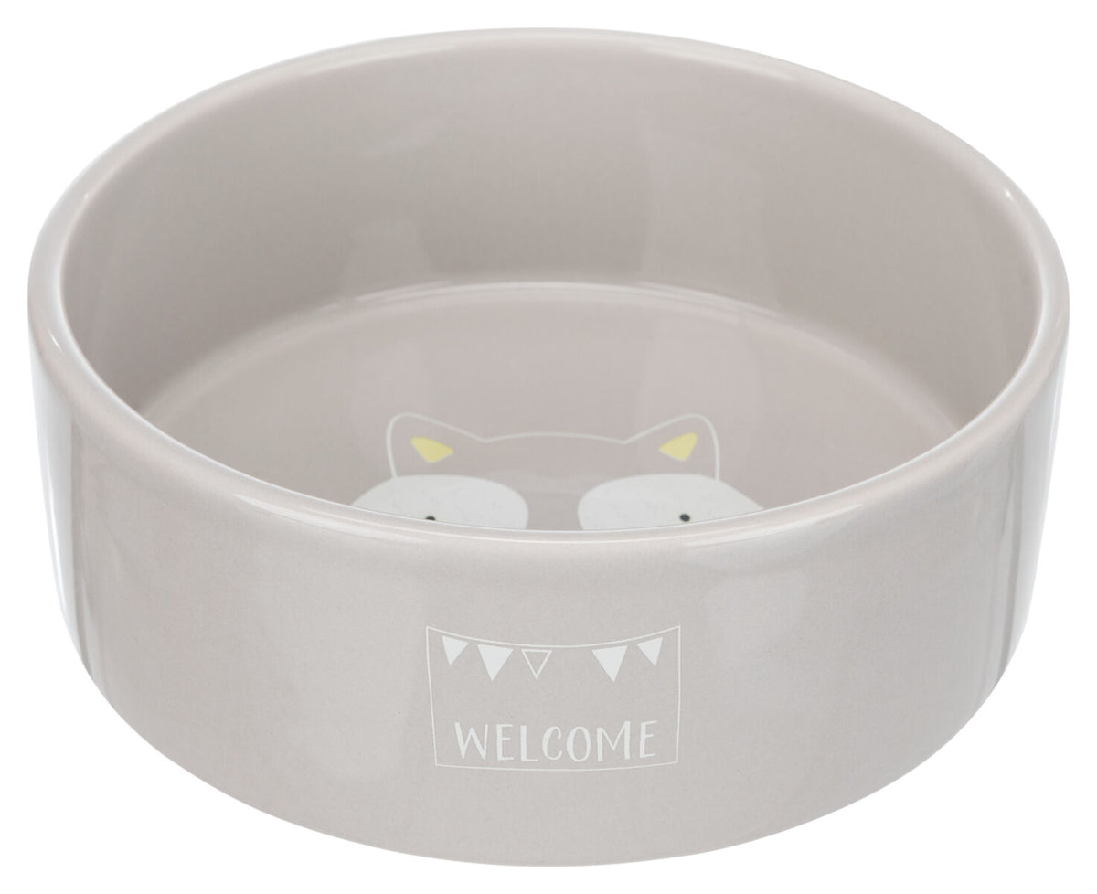 Graue, runde Schüssel mit Katzenmotiv innen und "WELCOME"-Schriftzug außen.