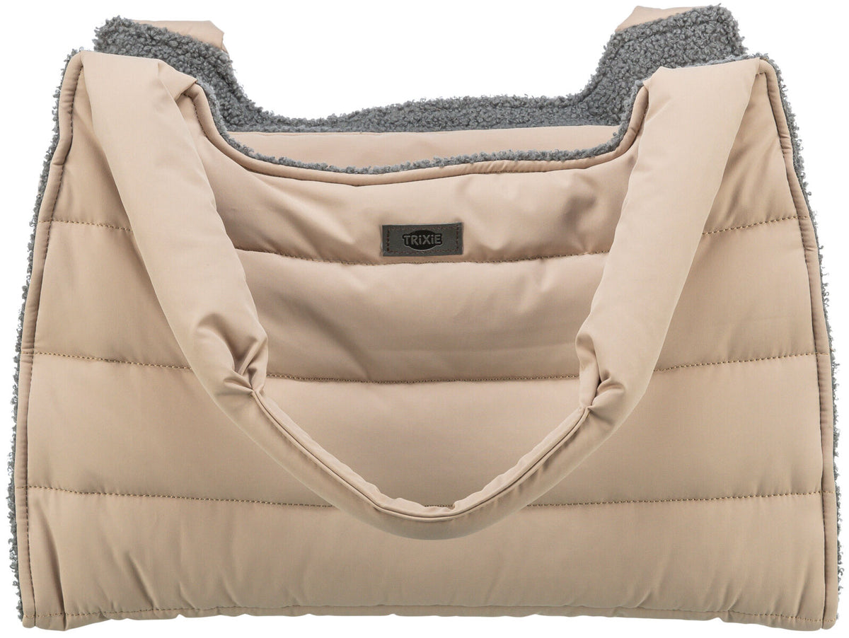 Beige Tragetasche mit gestepptem Design, weichem grauem Innenfutter und einem Etikett mit der Aufschrift "TRIXIE".