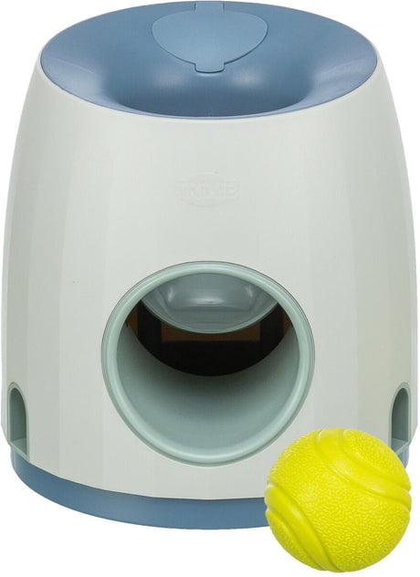 Weißer Automat mit blauem oberen Teil und gelbem Ball mit Struktur.