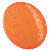 Rundes, oranges Objekt mit eingearbeiteten Pfotenabdrücken.