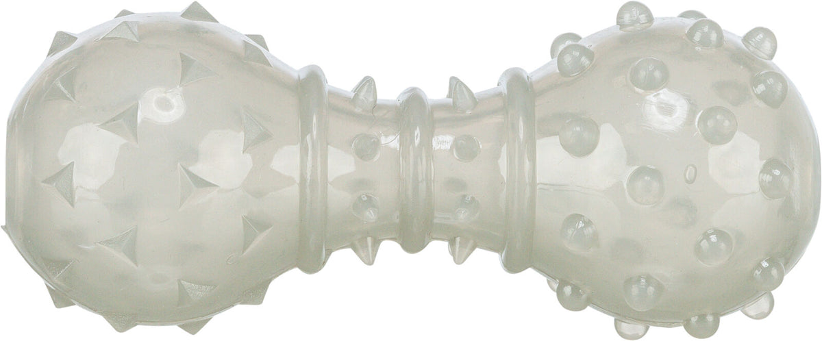 Transparenter Kauspielzeugknochen mit erhabenen Noppen und Pyramidenformen auf der Oberfläche.