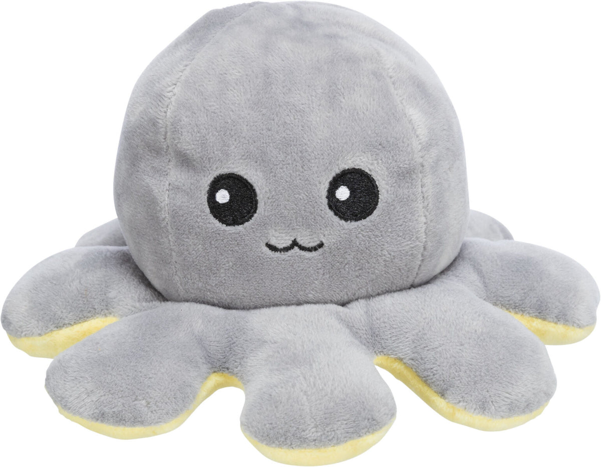 Grauer Plüsch-Oktopus mit lächelndem Gesicht und gelben Akzenten an den Tentakeln auf weißem Hintergrund.