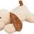 Ein weiches, beiges Kuscheltier in Form eines Hundes mit braunen Ohren und Schwanz liegt ausgestreckt.