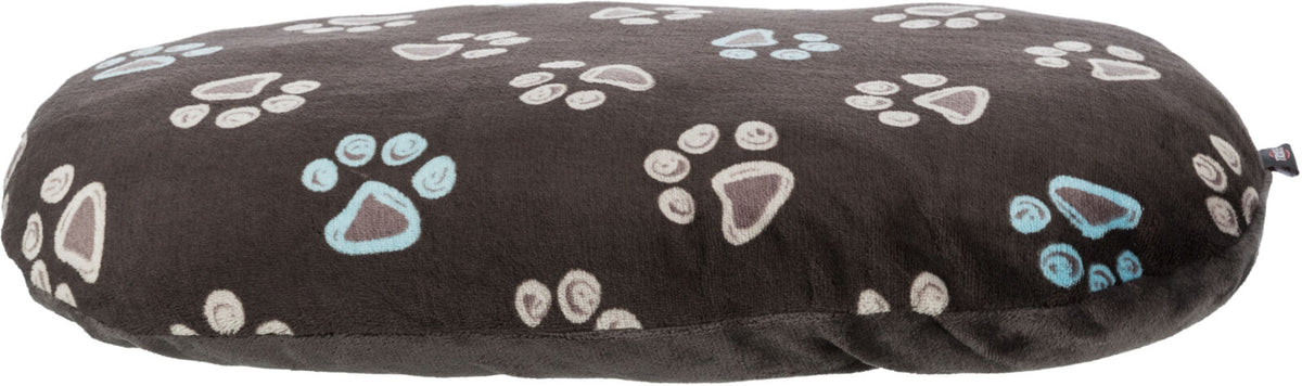Rundes, dunkles Hundekissen mit blauen und beigen Pfotenmustern.