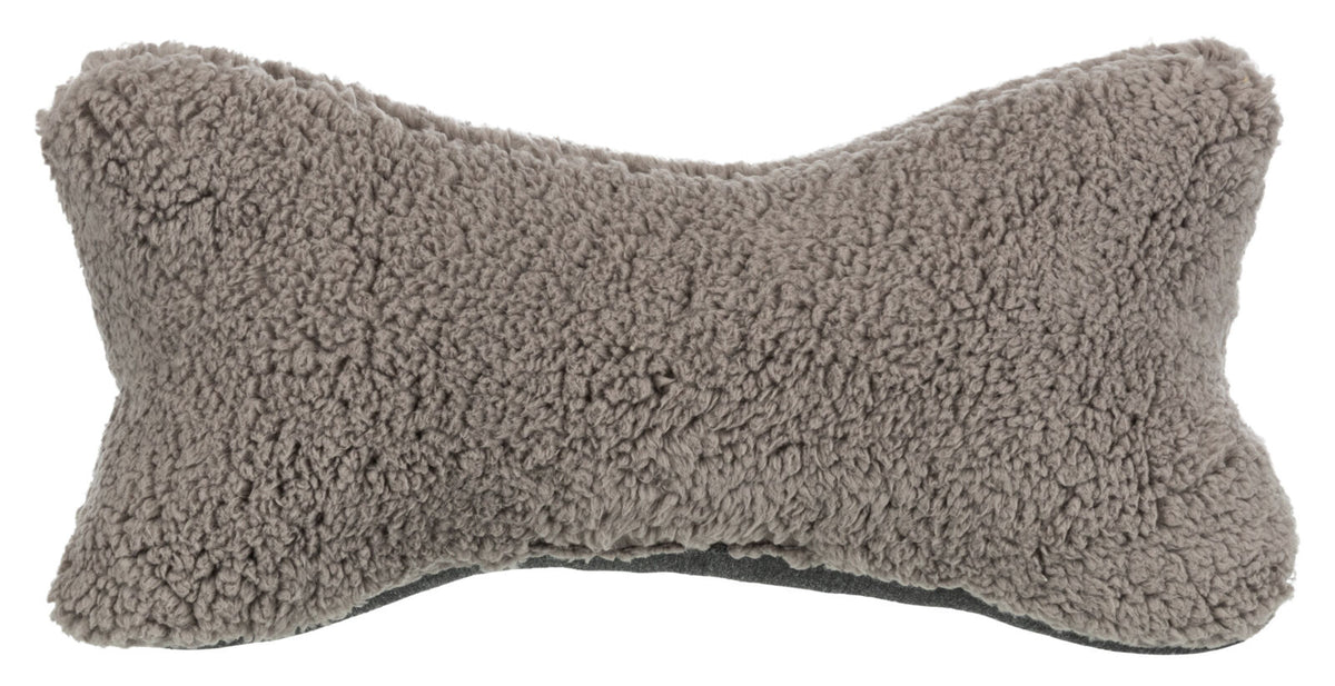 Graues, flauschiges Kissen in Knochenform mit weicher Textur und gleichmäßiger Oberfläche.
