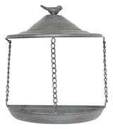 Rundes, hängendes Metallgestell mit Ketten und einem Vögelchen auf dem Deckel.