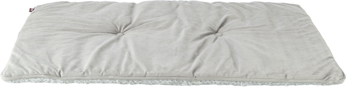 Beige, rechteckiges Kissen mit sichtbaren Nähten und weicher, plüschiger Unterseite.
